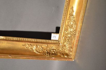 null Moulded wood frame with gilded stucco, decorated with palmettes and foliage...