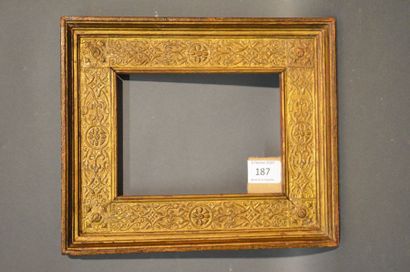 null CASSETTA FRAME in moulded oak with decoration in the dish of rinceaux in golden...