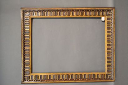 null FRAME in carved walnut partially gilded with pearls and canals
Florence, early...