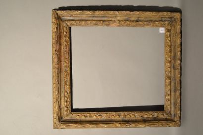 null FRAME in carved wood and silver plated with egg and leaf decoration
Naples,...