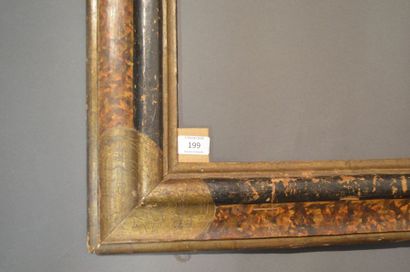 null RVERSE PROFILE FRAME made of moulded, painted and gilded wood with fake tortoiseshell...