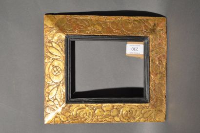 null RVERSE PROFILE FRAME in moulded and gilded wood with flowers in reparure, view...