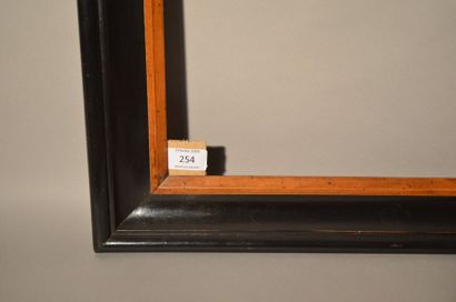 null Moulded and blackened wooden frame, view in natural
wood Italy, 19th century
(stitching)...