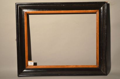 null Moulded and blackened wooden frame, view in natural
wood Italy, 19th century
(stitching)...