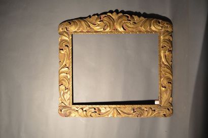 null * Carved and gilded wood frame decorated with foliated and openwork foliage...