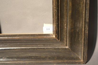 null CADRE À PROFIL RENVERSÉ en bois mouluré et noirci
Espagne, XVIIe siècle
28 x...