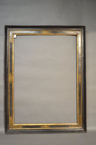 null CASSETTA FRAME in moulded oak with gilded decoration in the corners and in the...