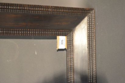null FRAME in blackened wood veneered on a softwood core with guilloche decoration...
