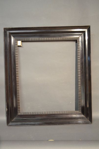 null FRAME in moulded ebony with guilloché decoration on a 17th century

Dutch fir...