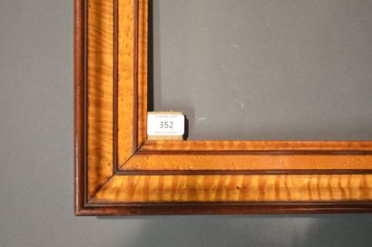 null FRAME in moulded wood veneered with maple burr veneer, probably made by SAVARY
Charles...