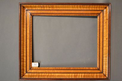 null FRAME in moulded wood veneered with maple burr veneer, probably made by SAVARY
Charles...
