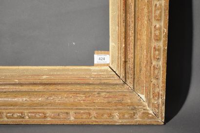 null FRAME in carved, painted and patinated wood with coarse-grained decoration,...