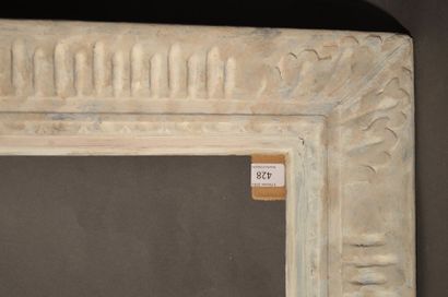 null FRAME in carved, painted and patinated wood with canals and acanthus leaves...