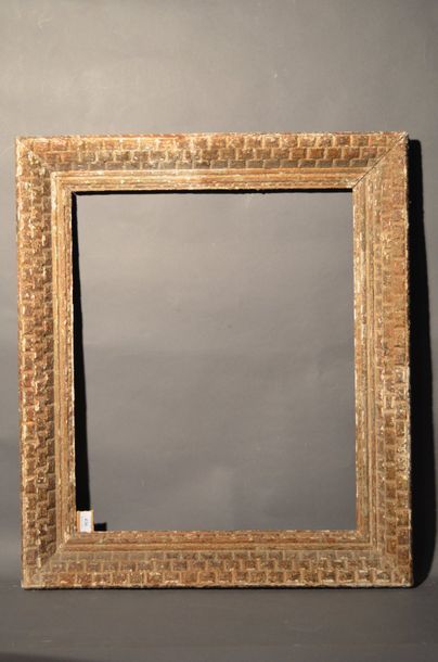 null FRAME in carved, painted and patinated wood with checkerboard pattern
Circa...