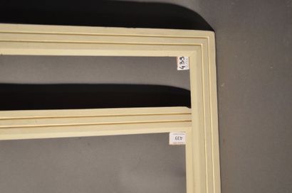 null Pair of off-white molded and painted wooden frames with
20th century fluted...