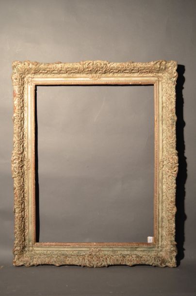 null FRAME in moulded wood and patinated stucco with Louis XIV
style decoration Circa...