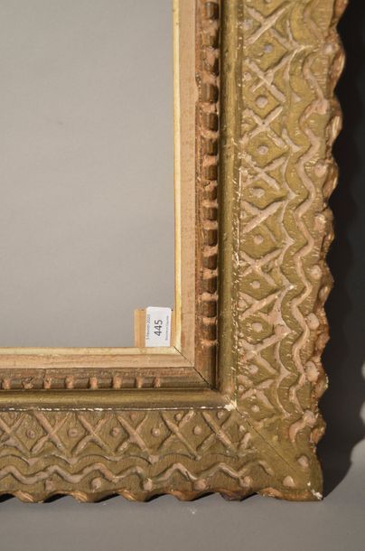null FRAME in carved, painted and patinated wood with latticework decoration, label...