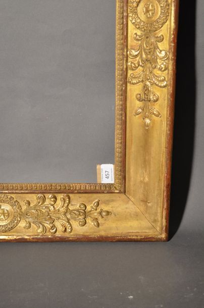 null FRAME in moulded wood and gilded stucco with crowns and stars in the centres...