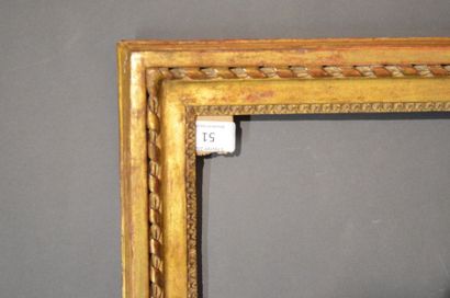 null FRAME in carved and gilded oak with ribbon and raise-de-coeur decoration at...