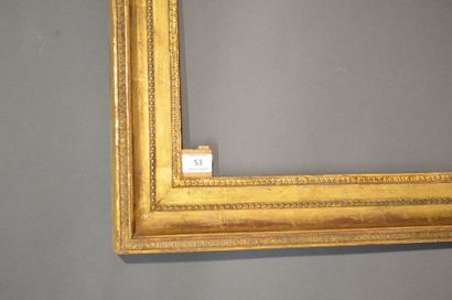 null Moulded oak and gilded stucco frame with piastres on the listel, pearls and...
