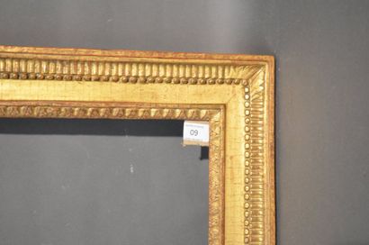 null Gilded and carved wooden frame decorated with small canals, pearls and heartbeads...