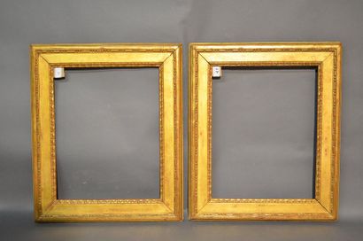 null Pair of carved oak frames decorated with a frieze of rosary and raise-of-heart...
