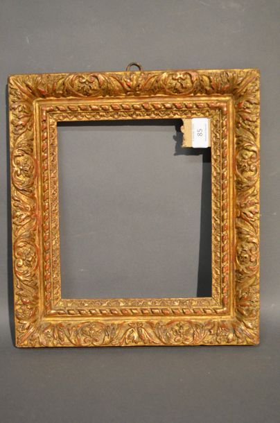 null FRAME in carved and gilded oak decorated with foliage and ribbons
Louis XIII...