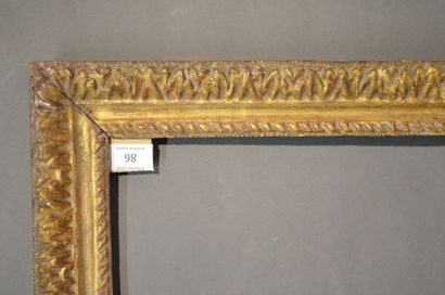null FRAME in carved and gilded oak with a frieze of acanthus leaves and ribbons
Louis...