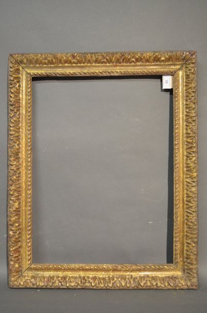 null FRAME in carved and gilded oak with a frieze of acanthus leaves and ribbons
Louis...
