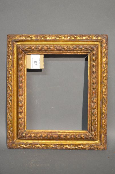 null RVERSE PROFILE FRAME in carved and gilded oak with base
decoration Louis XIII...