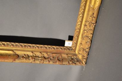 null FRAME in carved and gilded wood with rinceaux decoration in the corners
Provence...