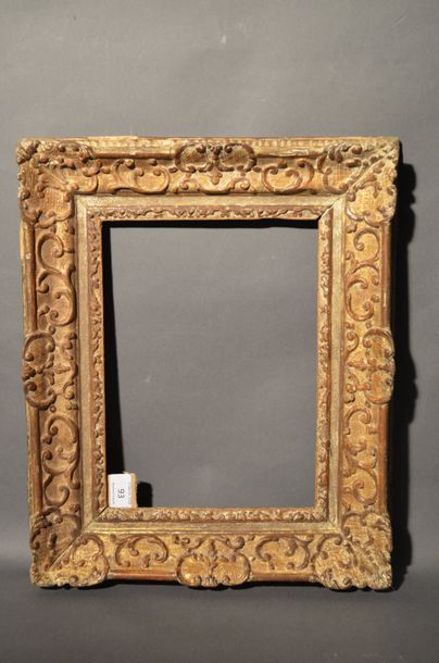null BEAUTIFUL CARVED AND GILTED OAK FRAME with Bérain
decoration Louis XIV period...