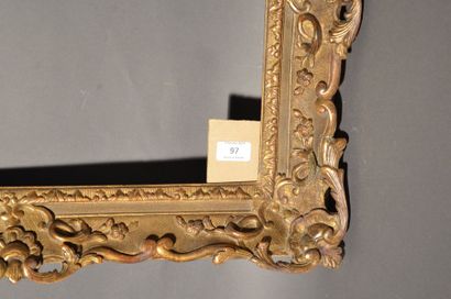 null FRAME in carved and gilded oak with shells and foliage decoration in the corners...