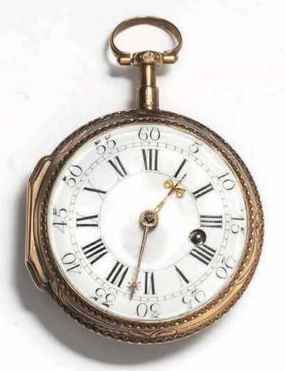 ANONYME - Fin du XVIIIe siècle 
Gold watch. Hinged case, the exterior with chiselled...