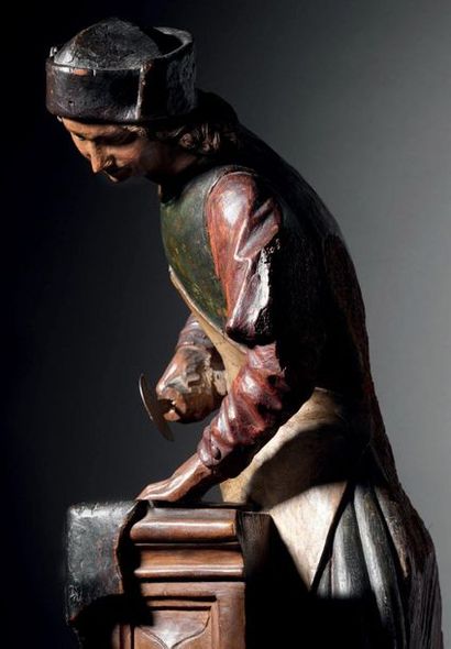 null Saint Crépin in walnut carved in almost round-humped partly polychromed.
Second...