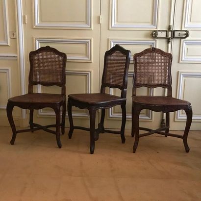 null Suite of three convertible chairs with cane bottom in molded beech wood carved...