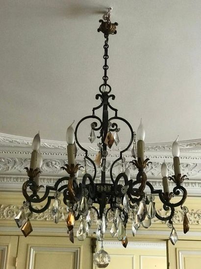 Wrought iron chandelier with eight arms of...