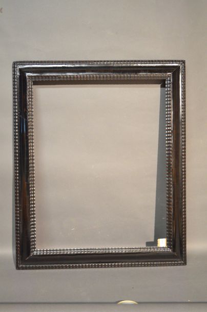 Wooden frame veneered and blackened with...