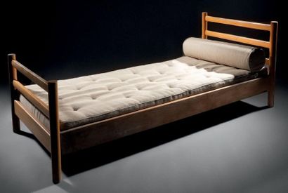 Charlotte PERRIAND (1903-1999) Veneered pine bed, c. 1960, with hollowed head and...