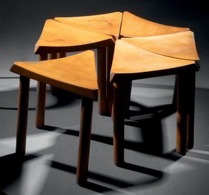 Pierre FAUCHEUX (1924-1999) 
Six varnished pine stools, ca. 1951, with triangular...
