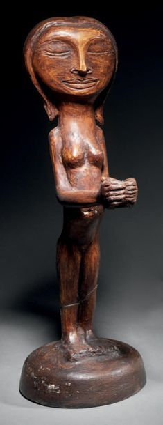 Anton PRINNER (1902-1983) 
Woman standing with hands joined
Patinated gilt bronze,...