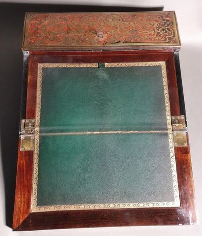null Inlaid desk writing case in red tinted tortoiseshell brass Boulle type, with...
