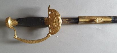  Officer's sword. Ebony checkered fuse. Brass mount. Guard to a leafy decorated branch....
