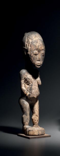 null STATUETTE BAOULE, IVORY

COAST Wood with eroded
brown patina H. 31 cm
Moving...