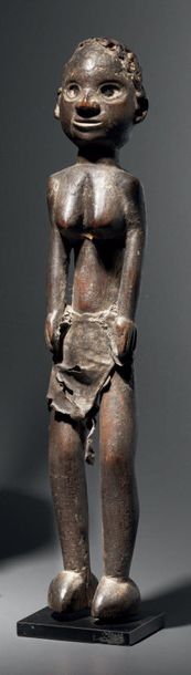 null *STATUETTE TIV, NIGÉRIA
Bois à patine brune foncée, cuir, graines d'argousier
H....