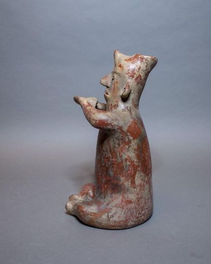 null SEATED SHAMAN

Colima Culture, Western Mexico

Protoclassical, 100 BC-250 AD.

H....