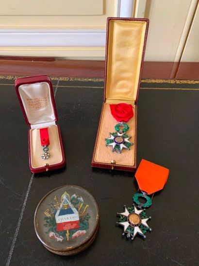 null Set of three Legion of Honour
medals, two large and one small.
Enclosed is a...