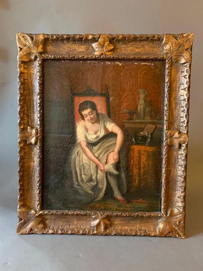 ECOLE FRANCAISE DU XIXème siècle 
Femme aux bas de soie blanche
Huile sur toile
Porte...