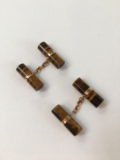 null Paire de boutons de manchette en quartz œil de tigre et or jaune 18k

9.4 g...