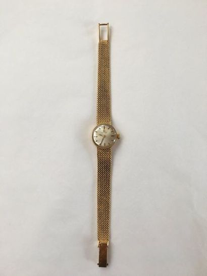 null TISSOT

Montre de dame en or jaune 18 k.

Bracelet à mailles en or jaune 18...